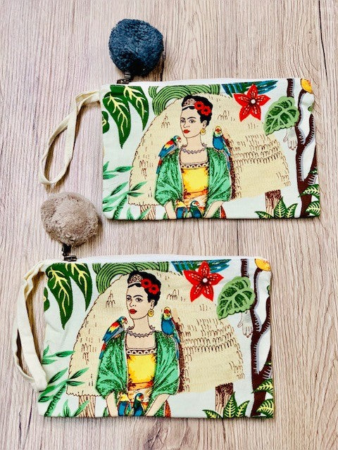 COTTON FRIDA PRINT POMPOM CLUTCH